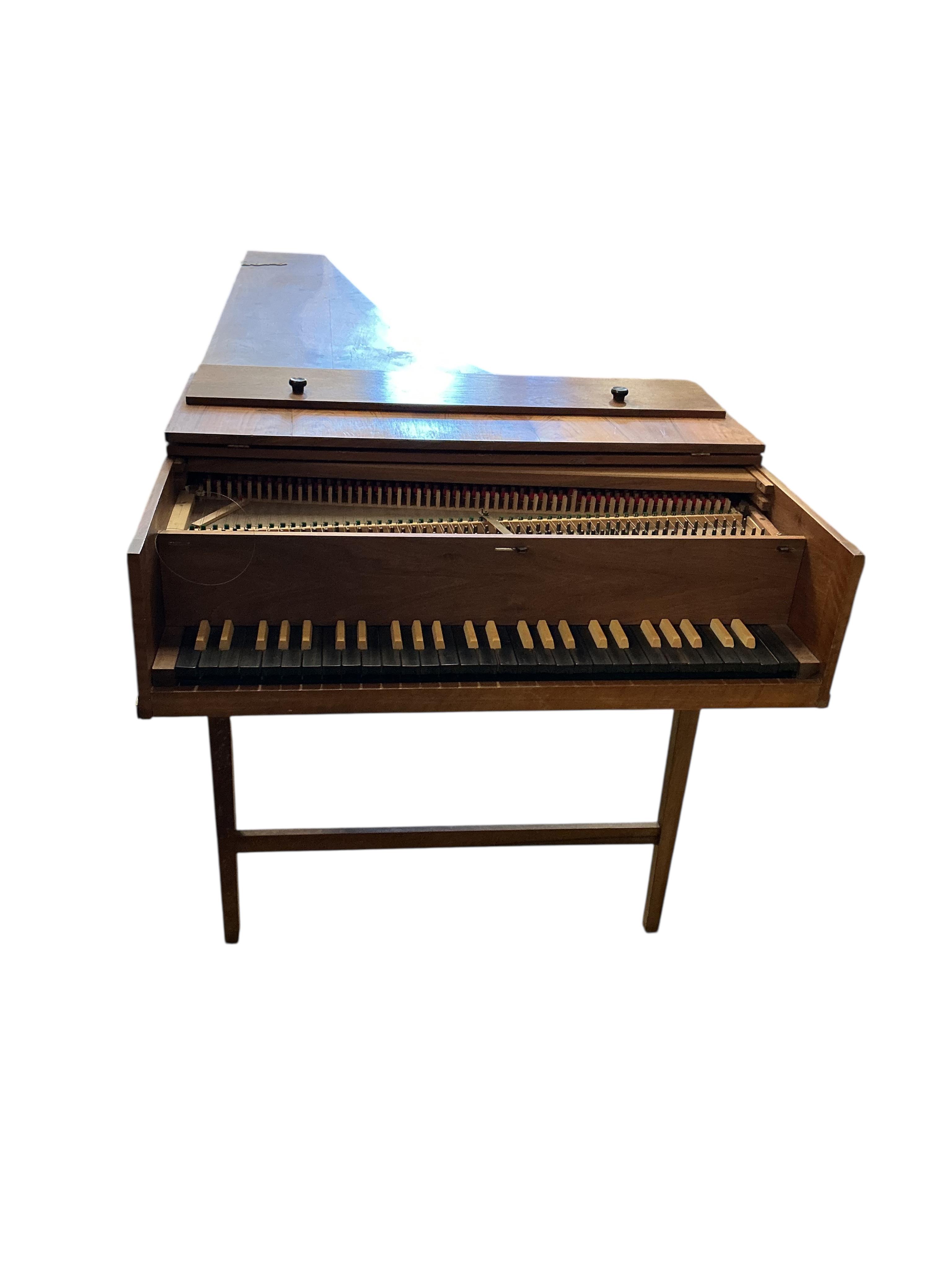 An Italian style single manual harpsichord built by Ian Gordon in 1989, in a walnut veneer case, Gordon is better known for his lutes, 54 note compass on small scale keys, and two stops, length 202cm